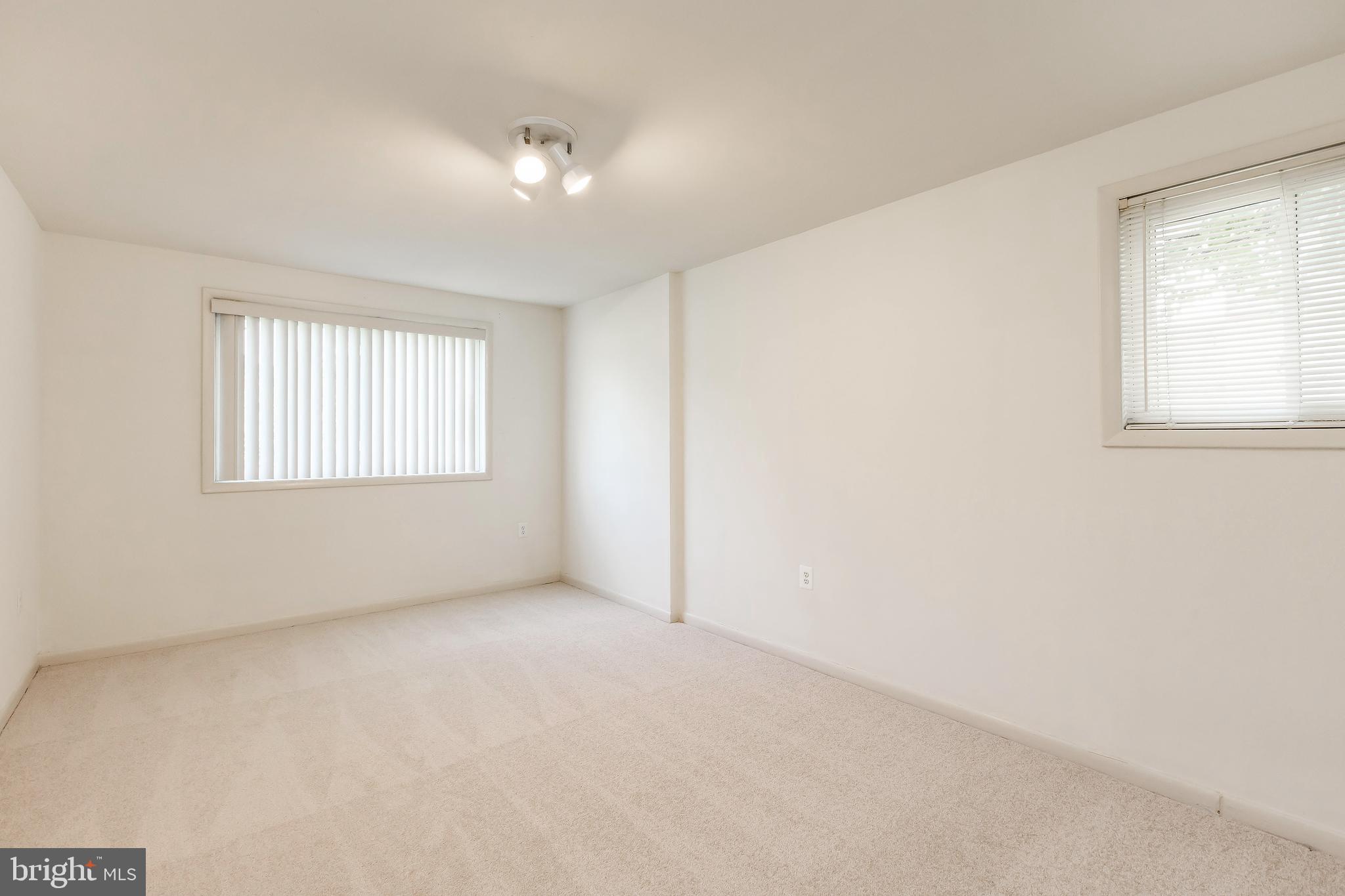 11601 Elkin Street, Unit 58 Silver Spring, MD 20902 - Photo 20 of 24 Master Bedroom