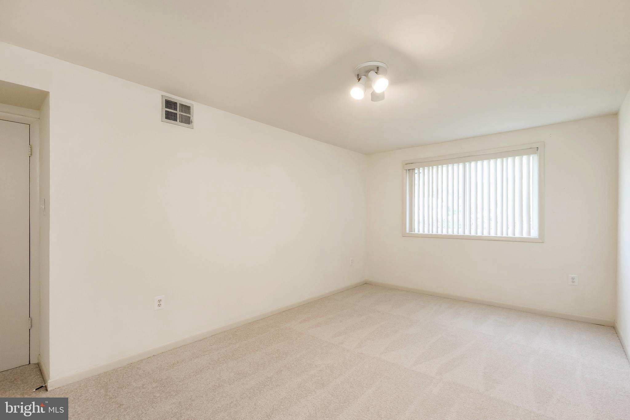 11601 Elkin Street, Unit 58 Silver Spring, MD 20902 - Photo 21 of 24 Master Bedroom