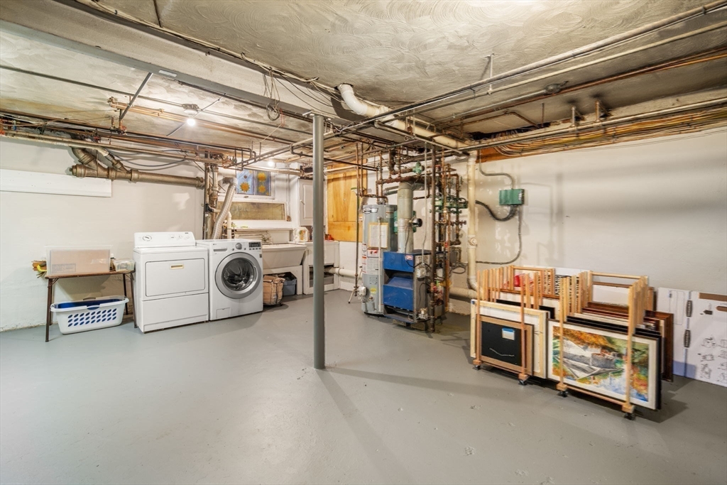 43 Palmer Road Newton, MA 02468 - Photo 31 of 40 a utility room with multiple dryer and washer