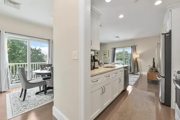 a spacious bathroom with a double vanity sink and a window