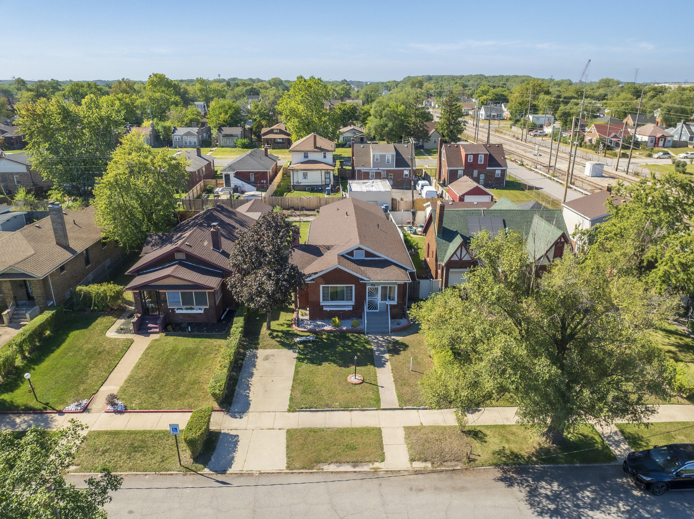 314 Cleveland Street Gary, IN 46404 - Photo 55 of 60 an aerial view of residential houses with yard