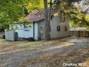 a view of a house with a back yard