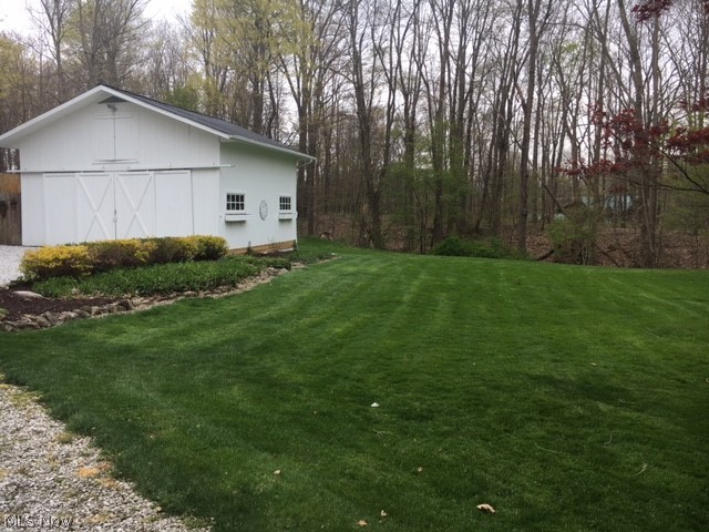 486 East Garfield Road Aurora, OH 44202 - Photo 21 of 29 Beautiful wooded view from the back of the house!