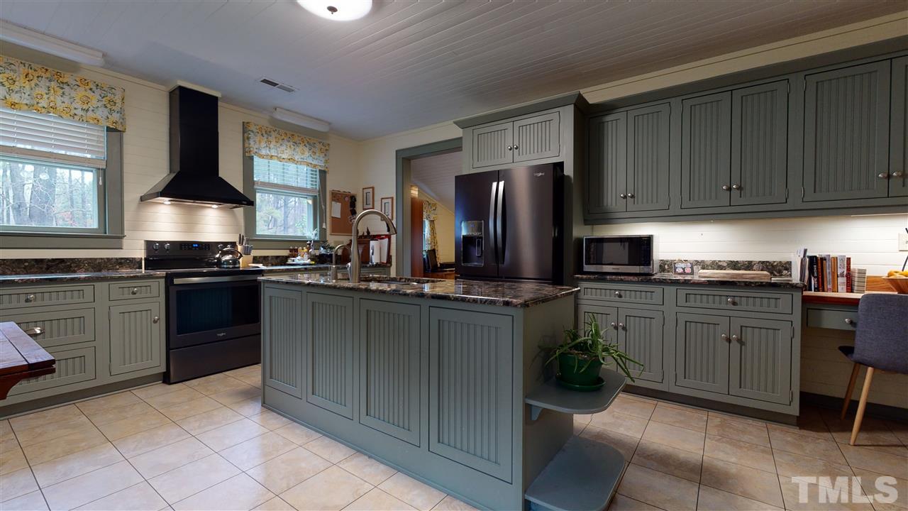 4007 Redwood Road Durham, NC 27704 - Photo 16 of 30 $40,000 kitchen renovation is just a couple years old. Black stainless appliances installed in 2019.