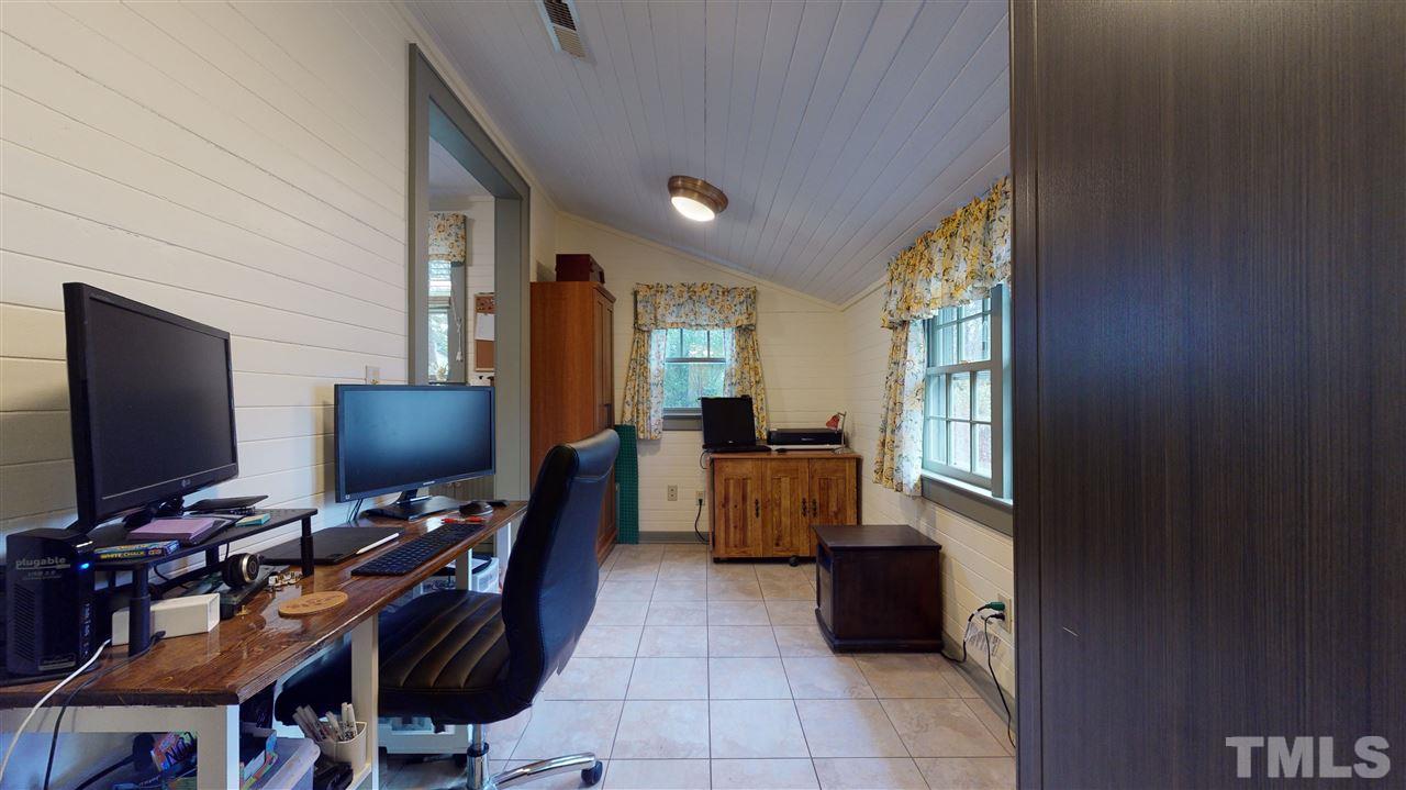 4007 Redwood Road Durham, NC 27704 - Photo 20 of 30 Everyone needs a work space with this much natural light.