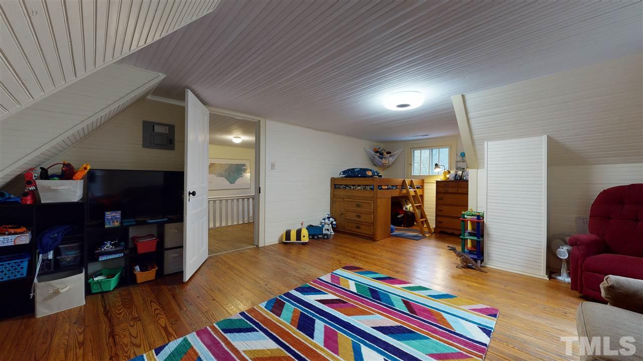 4007 Redwood Road Durham, NC 27704 - Photo 28 of 30 Huge secondary bedroom feels like a studio. Large closets and lots of natural light.