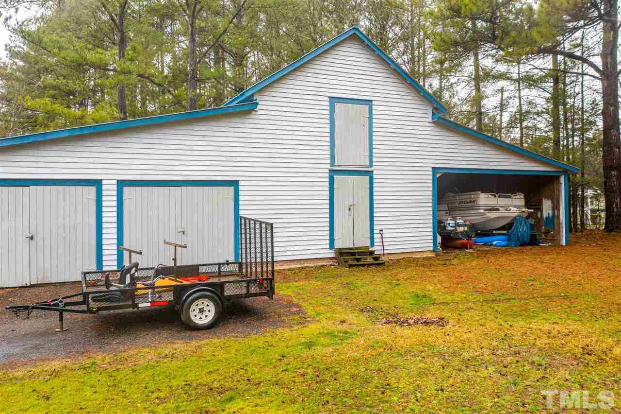 4007 Redwood Road Durham, NC 27704 - Photo 8 of 30 Two car garage, Two story workshop and RV/Boat parking.