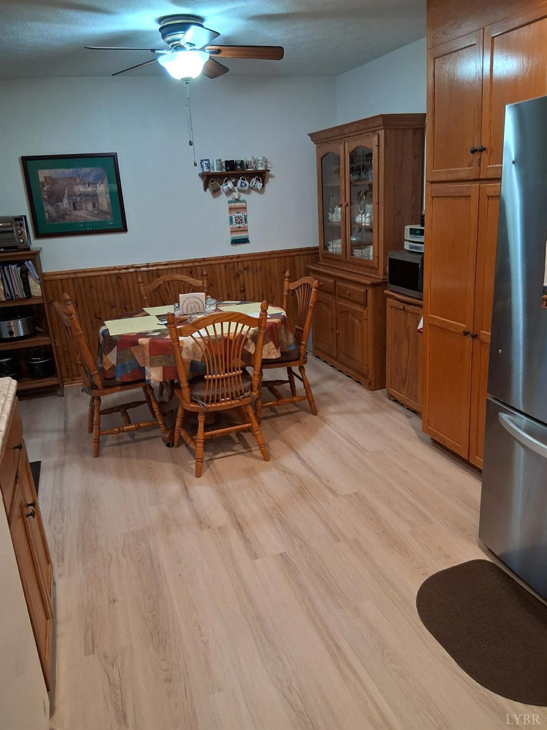 2121 Sunburst Road Evington, VA 24550 - Photo 12 of 41 a dining room with furniture and window