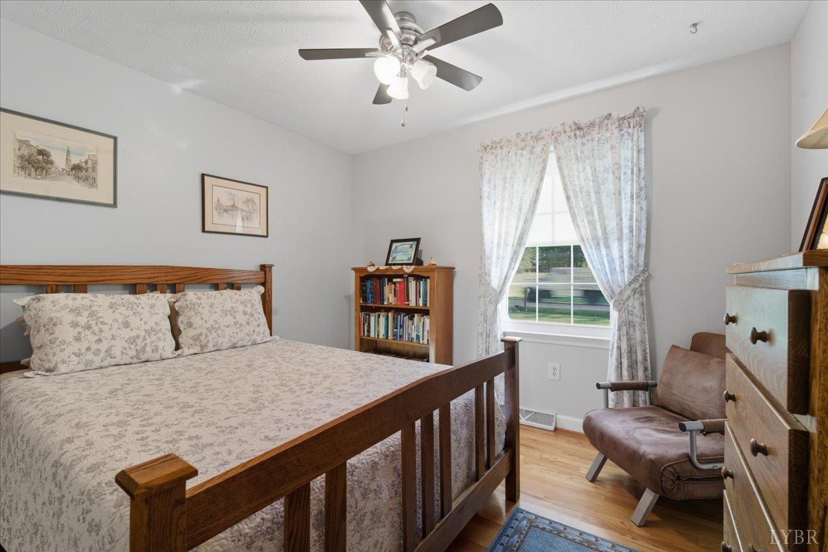 2121 Sunburst Road Evington, VA 24550 - Photo 20 of 41 a bedroom with furniture and a window