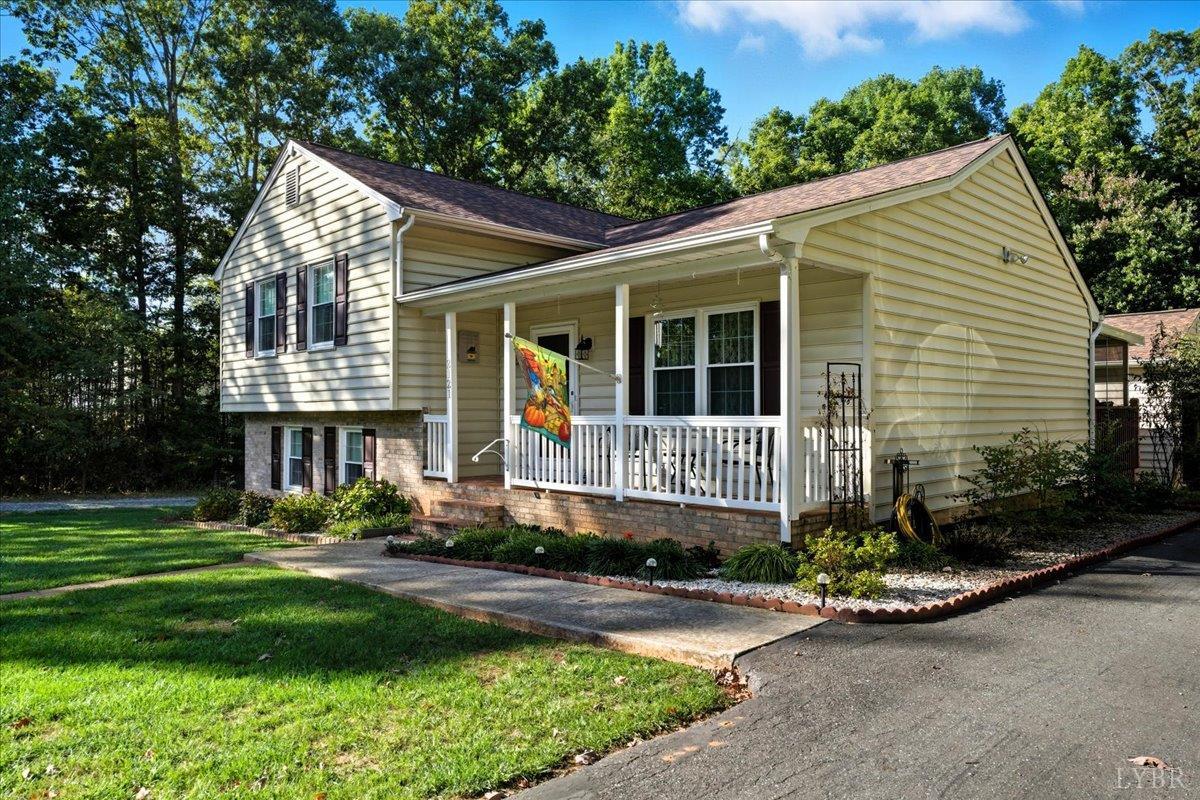 2121 Sunburst Road Evington, VA 24550 - Photo 2 of 41 a view of a house with a yard and plants