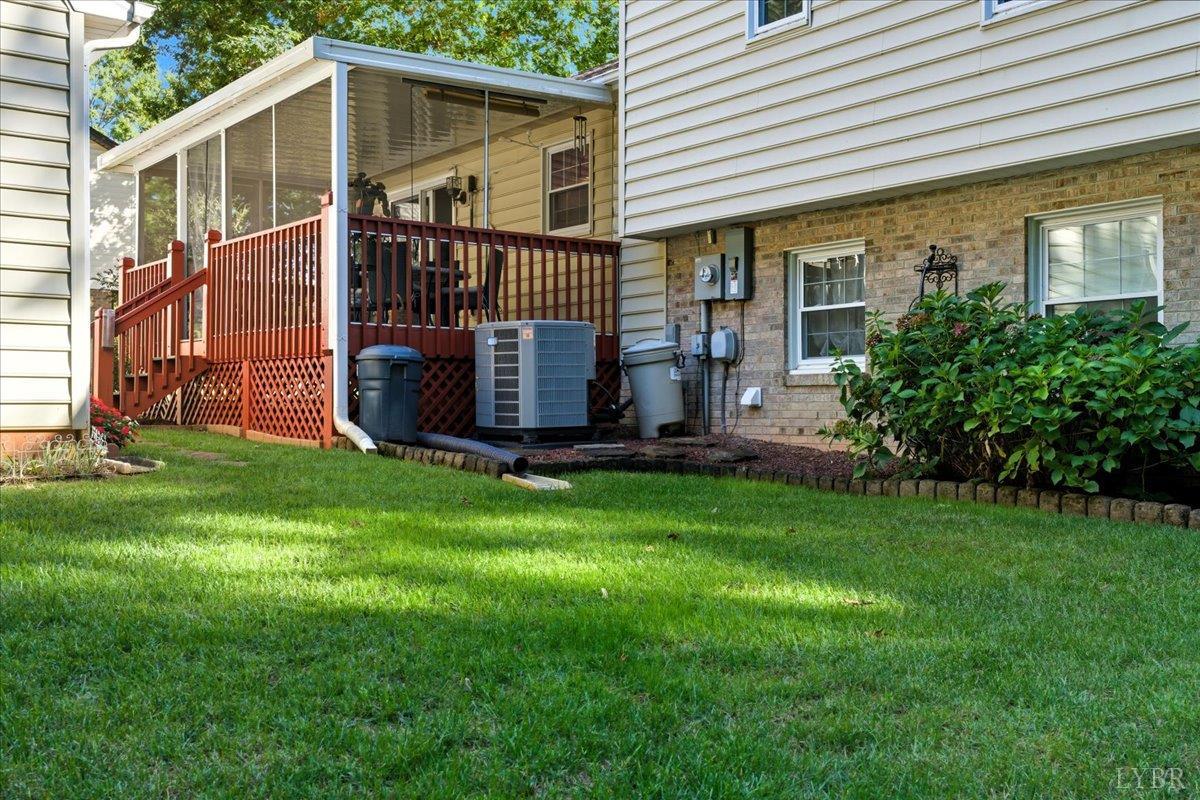 2121 Sunburst Road Evington, VA 24550 - Photo 32 of 41 a view of a house with a yard and deck