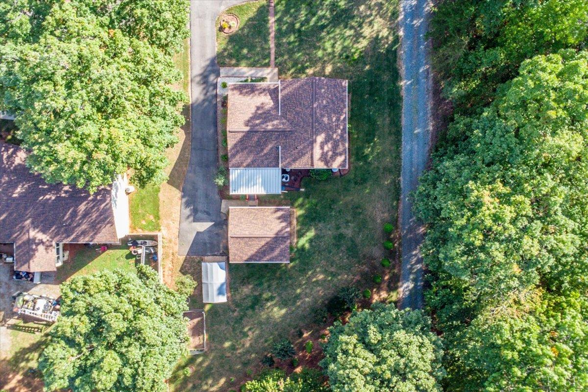 2121 Sunburst Road Evington, VA 24550 - Photo 35 of 41 an aerial view of a house with a yard and garden
