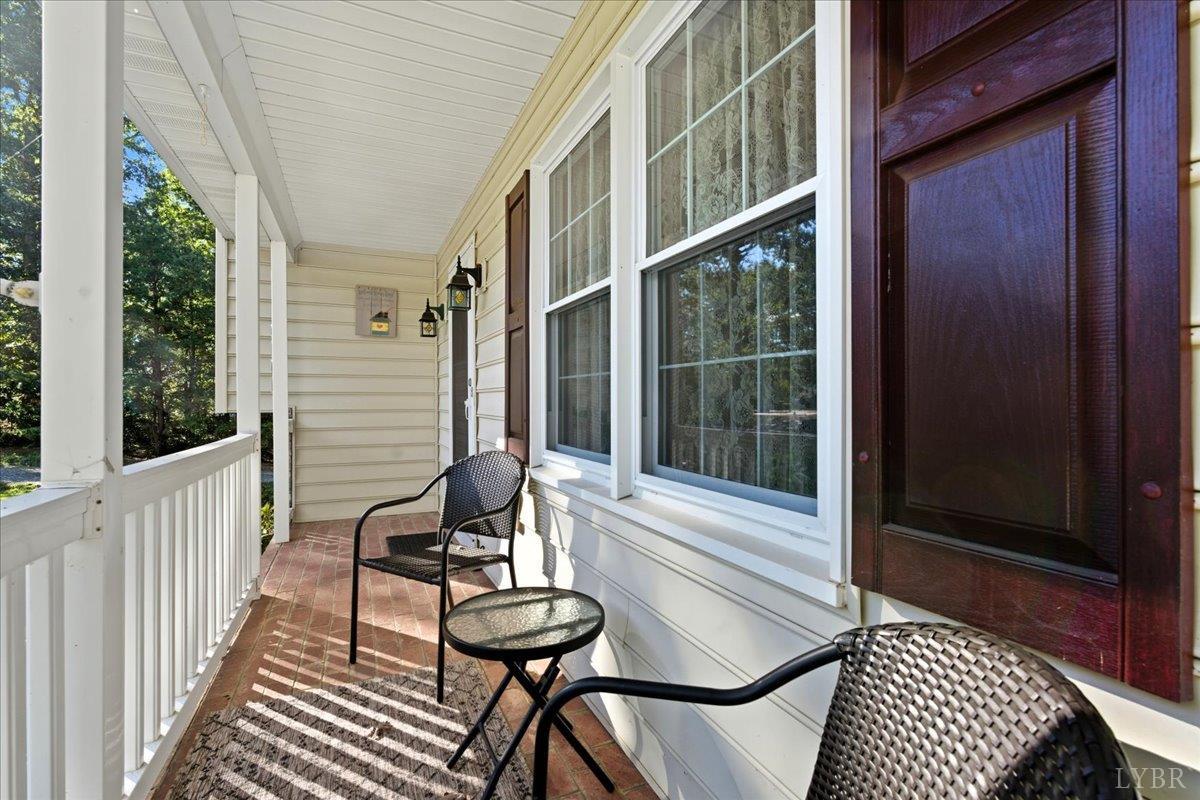 2121 Sunburst Road Evington, VA 24550 - Photo 4 of 41 a view of balcony with wooden floor