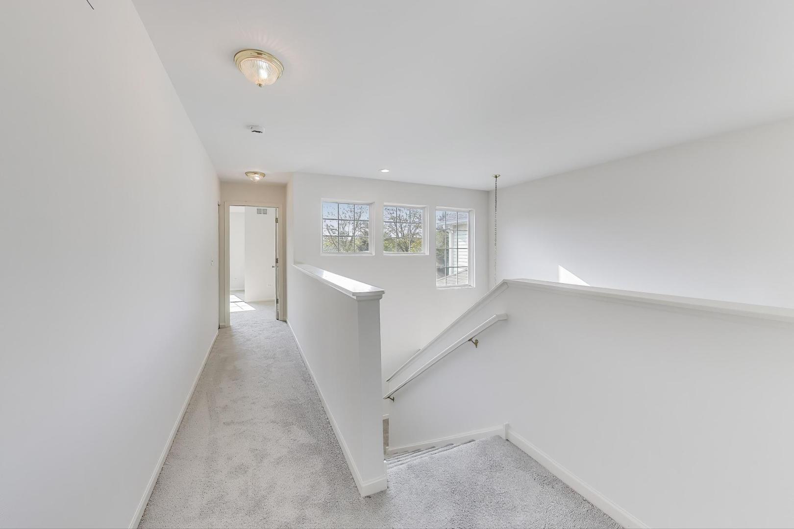 1677 South Candlestick Way Waukegan, IL 60048 - Photo 13 of 30 a view of a hallway with an entryway