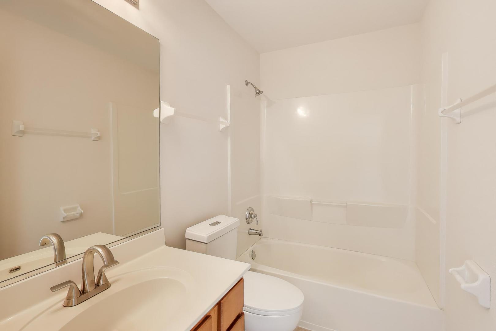 1677 South Candlestick Way Waukegan, IL 60048 - Photo 21 of 30 a bathroom with a sink toilet and shower