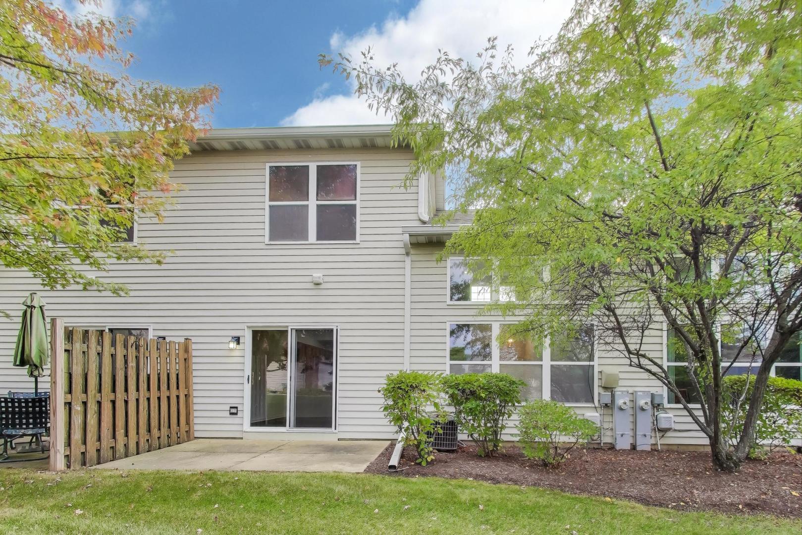 1677 South Candlestick Way Waukegan, IL 60048 - Photo 22 of 30 a front view of a house with garden