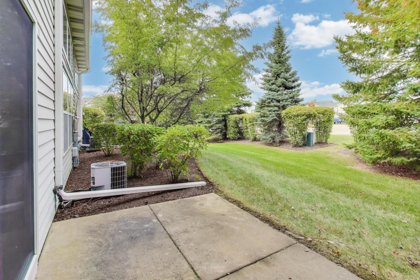 1677 South Candlestick Way Waukegan, IL 60048 - Photo 25 of 30 a view of backyard with garden