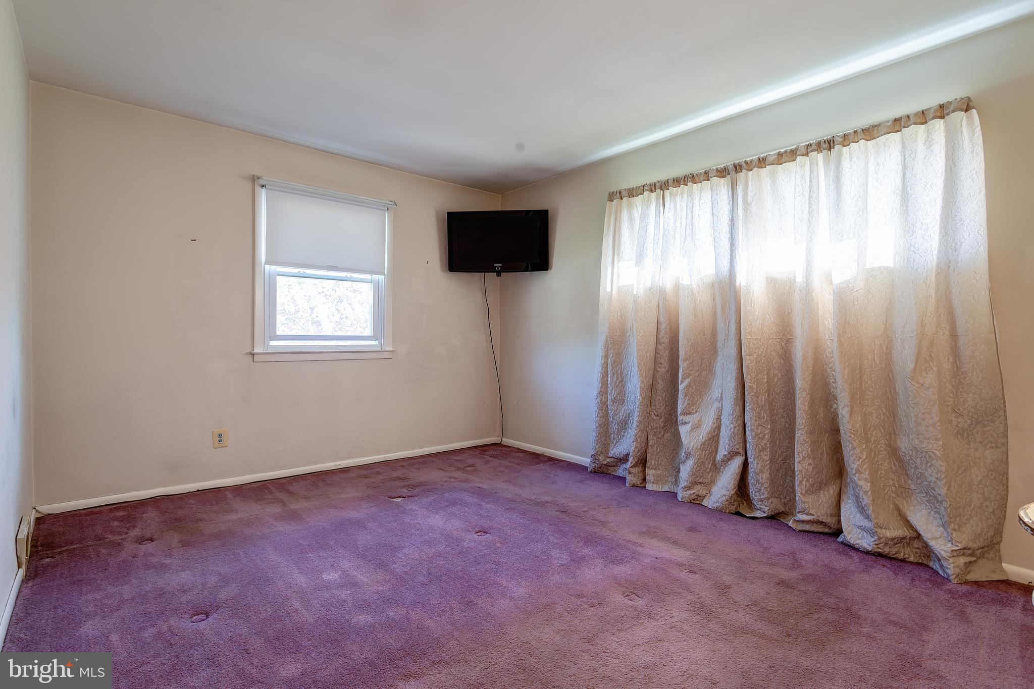 1105 Wynnbrook Road Secane, PA 19018 - Photo 14 of 30 a view of an empty room with a window