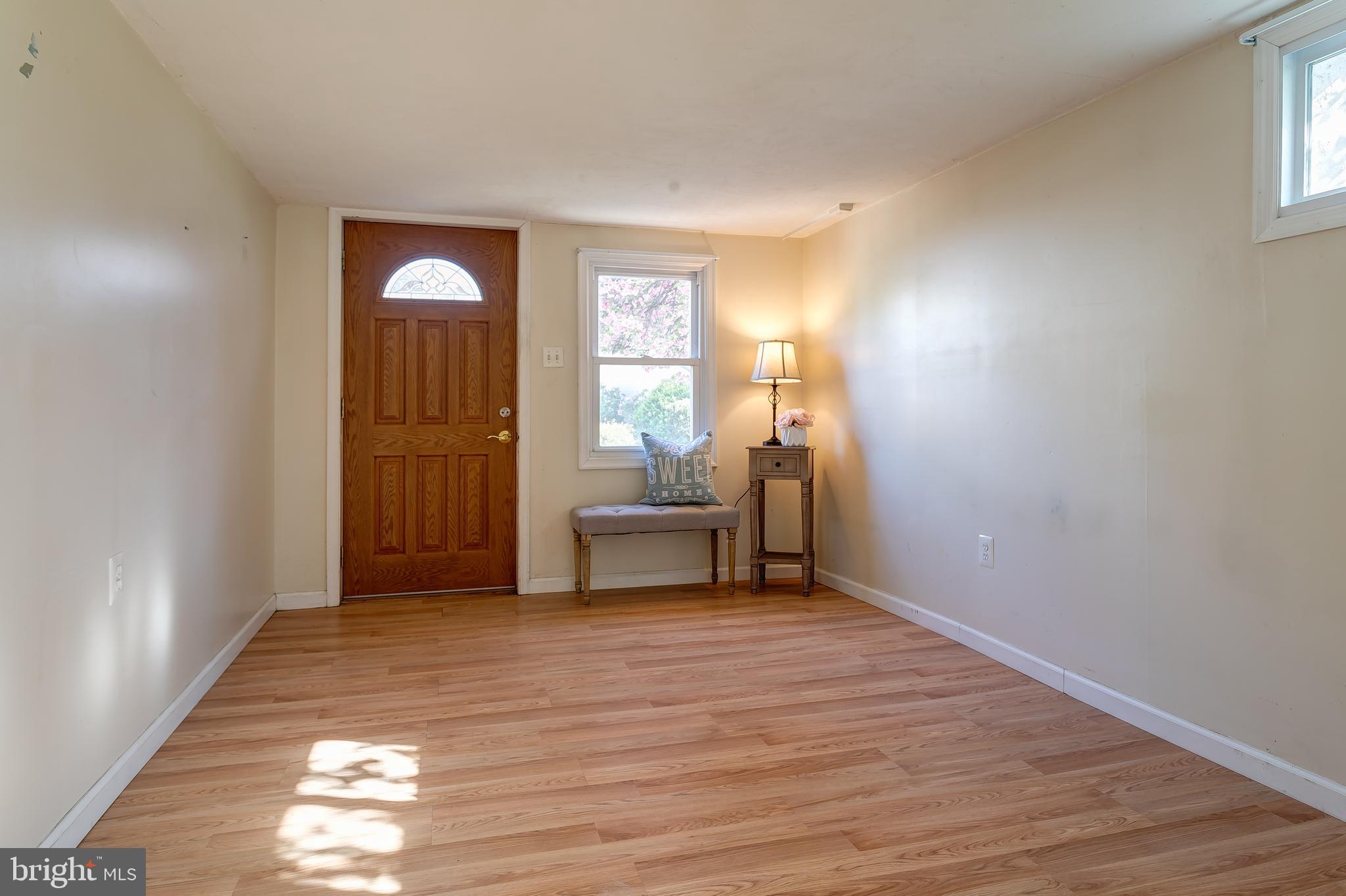 1105 Wynnbrook Road Secane, PA 19018 - Photo 19 of 30 a view of empty room with wooden floor and fan