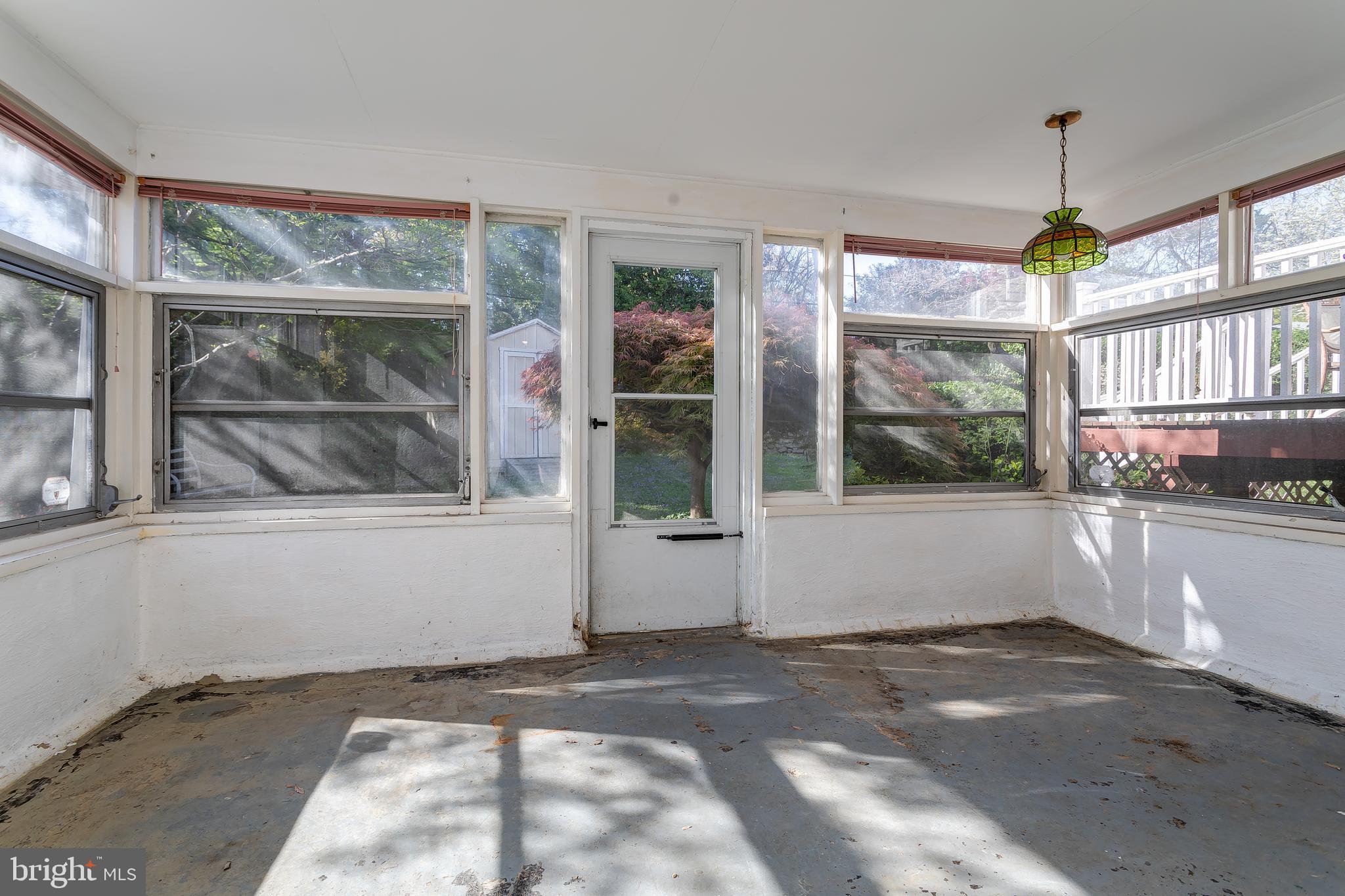 1105 Wynnbrook Road Secane, PA 19018 - Photo 24 of 30 a view of a house with a porch