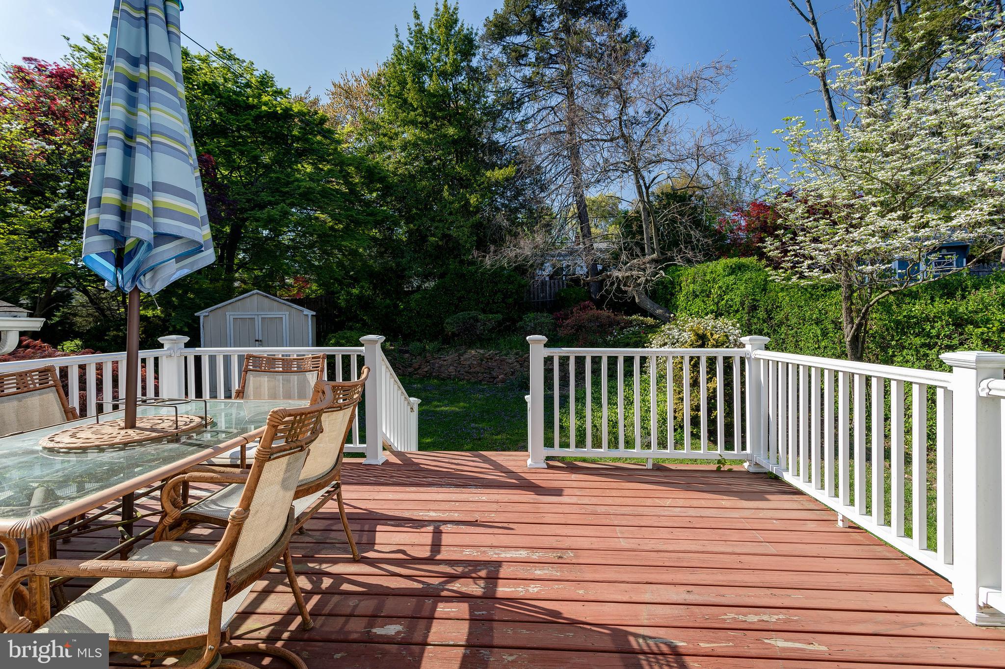 1105 Wynnbrook Road Secane, PA 19018 - Photo 25 of 30 a view of deck with two chairs and wooden fence