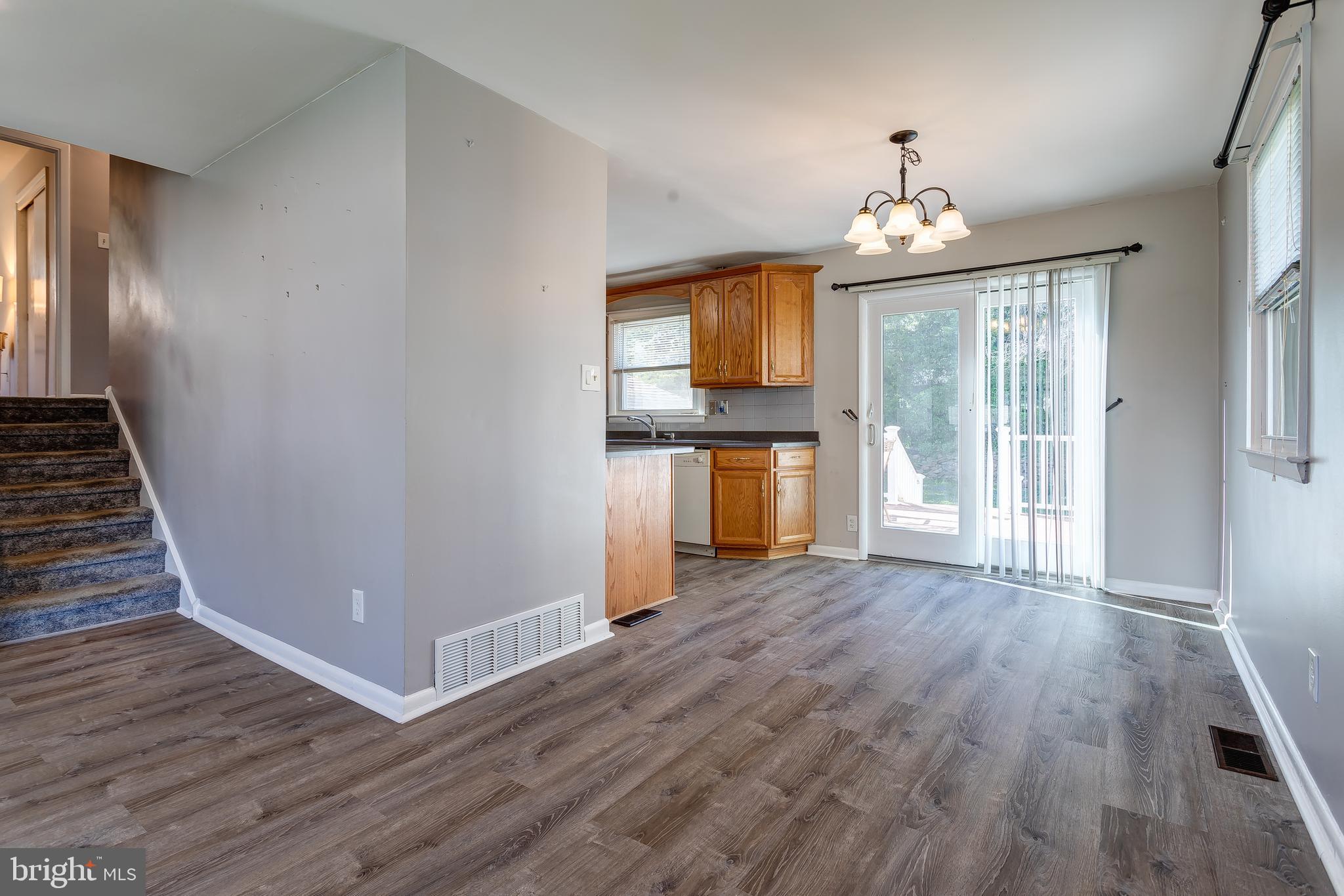 1105 Wynnbrook Road Secane, PA 19018 - Photo 7 of 30 wooden floor in an empty room with a window