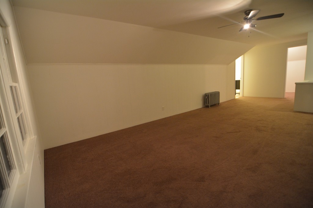 191 Pasco Road Springfield, MA 01151 - Photo 13 of 20 an empty room with a empty space and windows