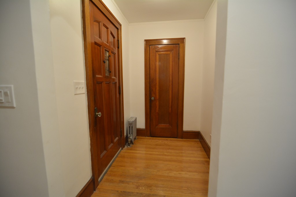 191 Pasco Road Springfield, MA 01151 - Photo 4 of 20 a view of a hallway with wooden floor