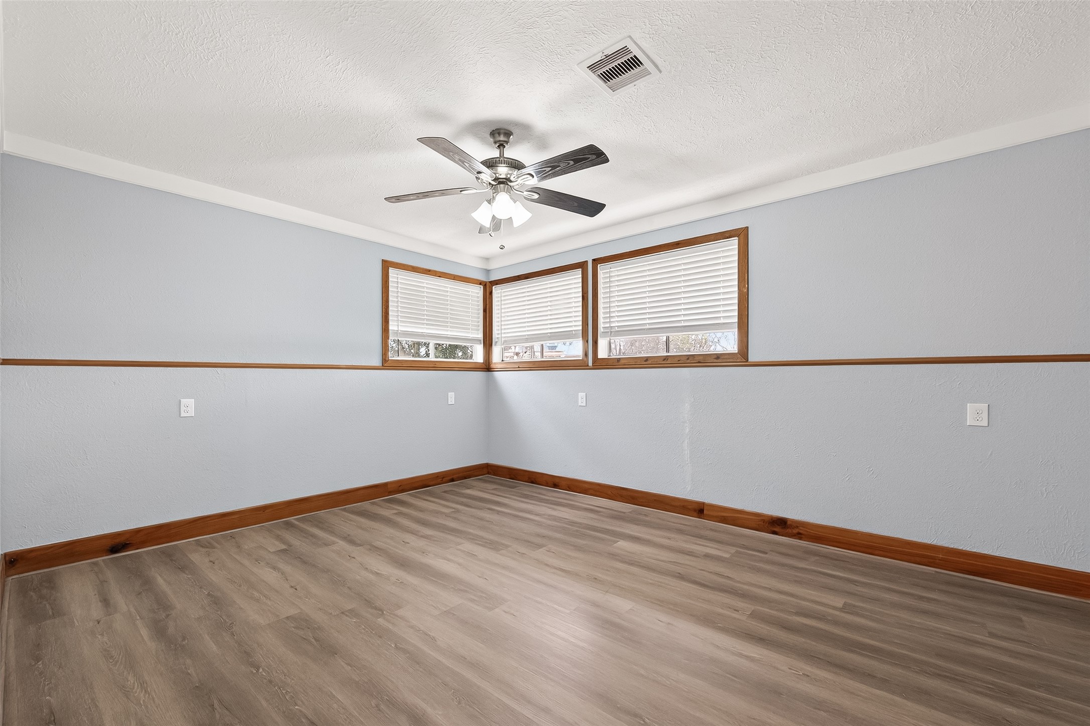 403 Wrangler Road Simonton, TX 77485 - Photo 24 of 33 wooden floor in an empty room with a window