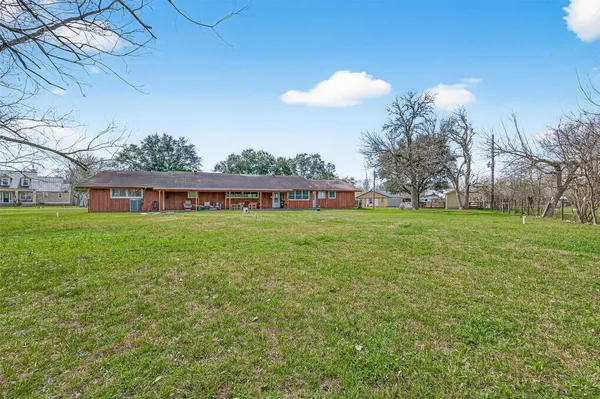 a view of a house with a big yard