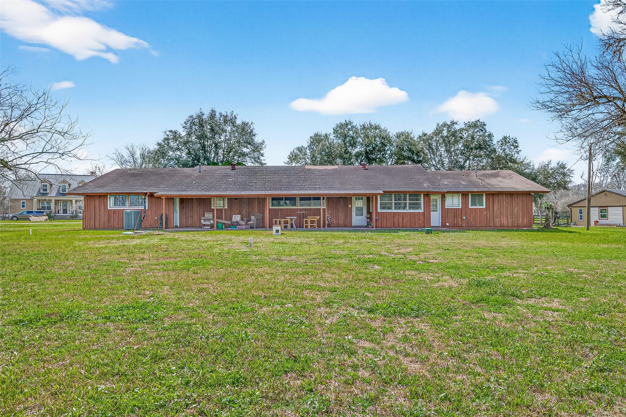 403 Wrangler Road Simonton, TX 77485 - Photo 27 of 33 a front view of house with yard outdoor seating and barbeque oven