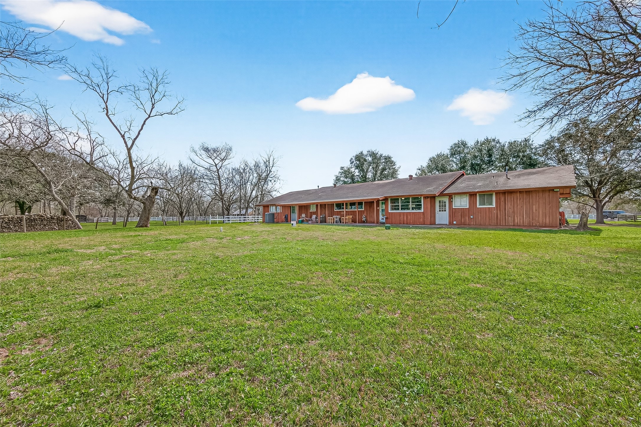 403 Wrangler Road Simonton, TX 77485 - Photo 28 of 33 a view of a house with a yard