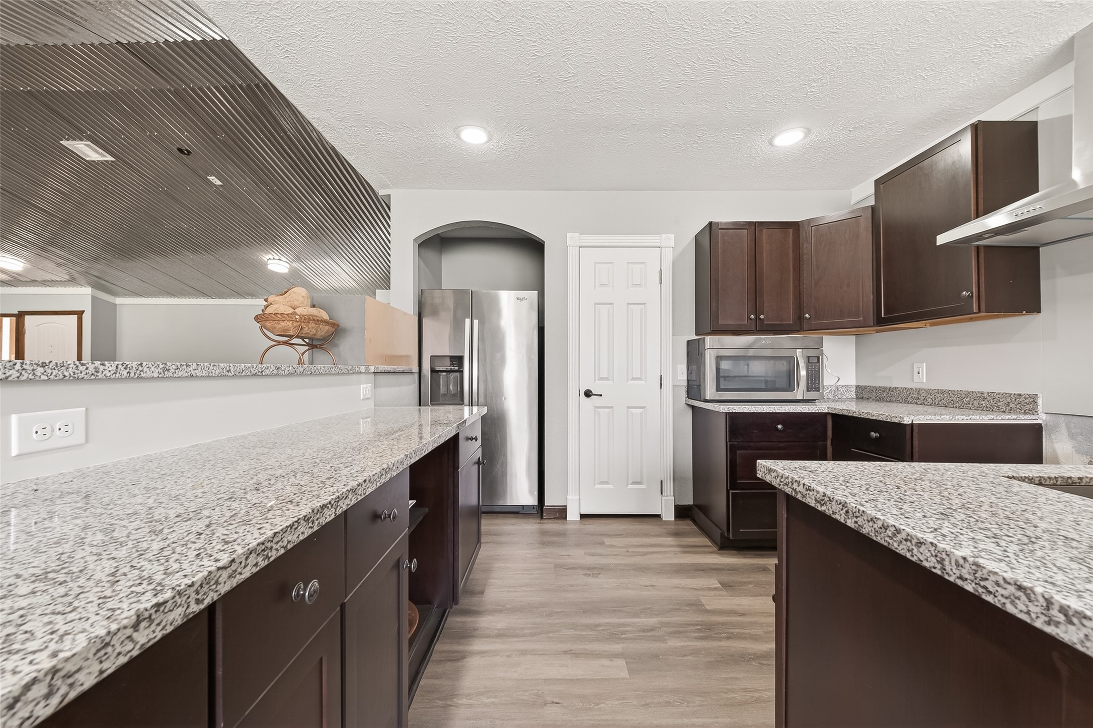 403 Wrangler Road Simonton, TX 77485 - Photo 4 of 33 a kitchen with stainless steel appliances granite countertop a counter top a stove a sink and a refrigerator