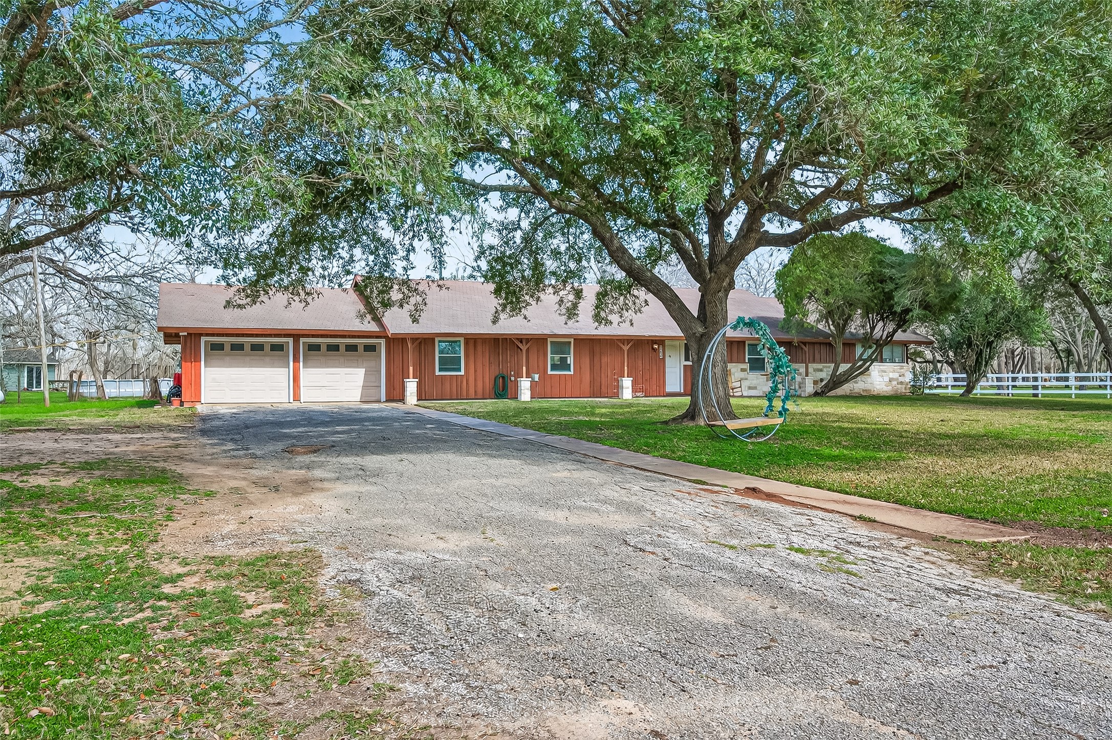 403 Wrangler Road Simonton, TX 77485 - Photo 7 of 33 a front view of a house with a yard