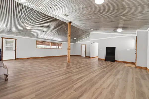a view of a livingroom with wooden floor