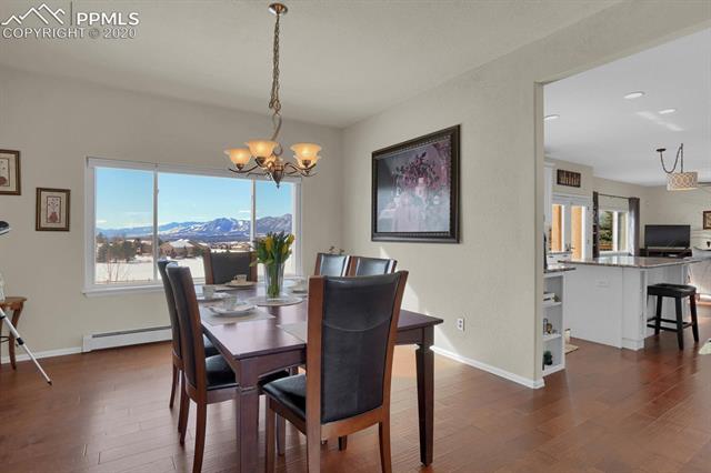 965 Bowstring Road Monument, CO 80132 - Photo 12 of 34 Dining room with more views.