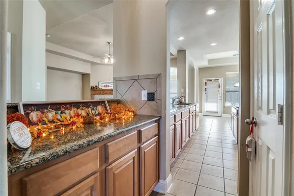 a view of a hallway and a chandelier