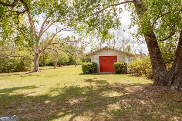 a view of a front door of a house with a garage