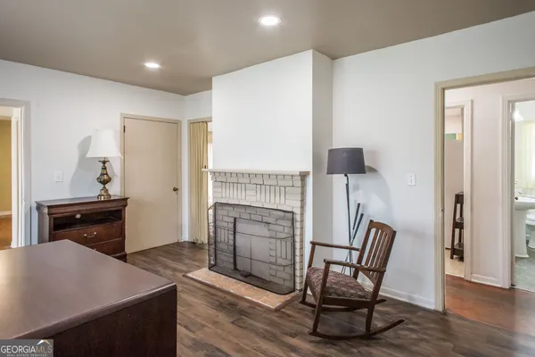 a room with cabinets and a refrigerator