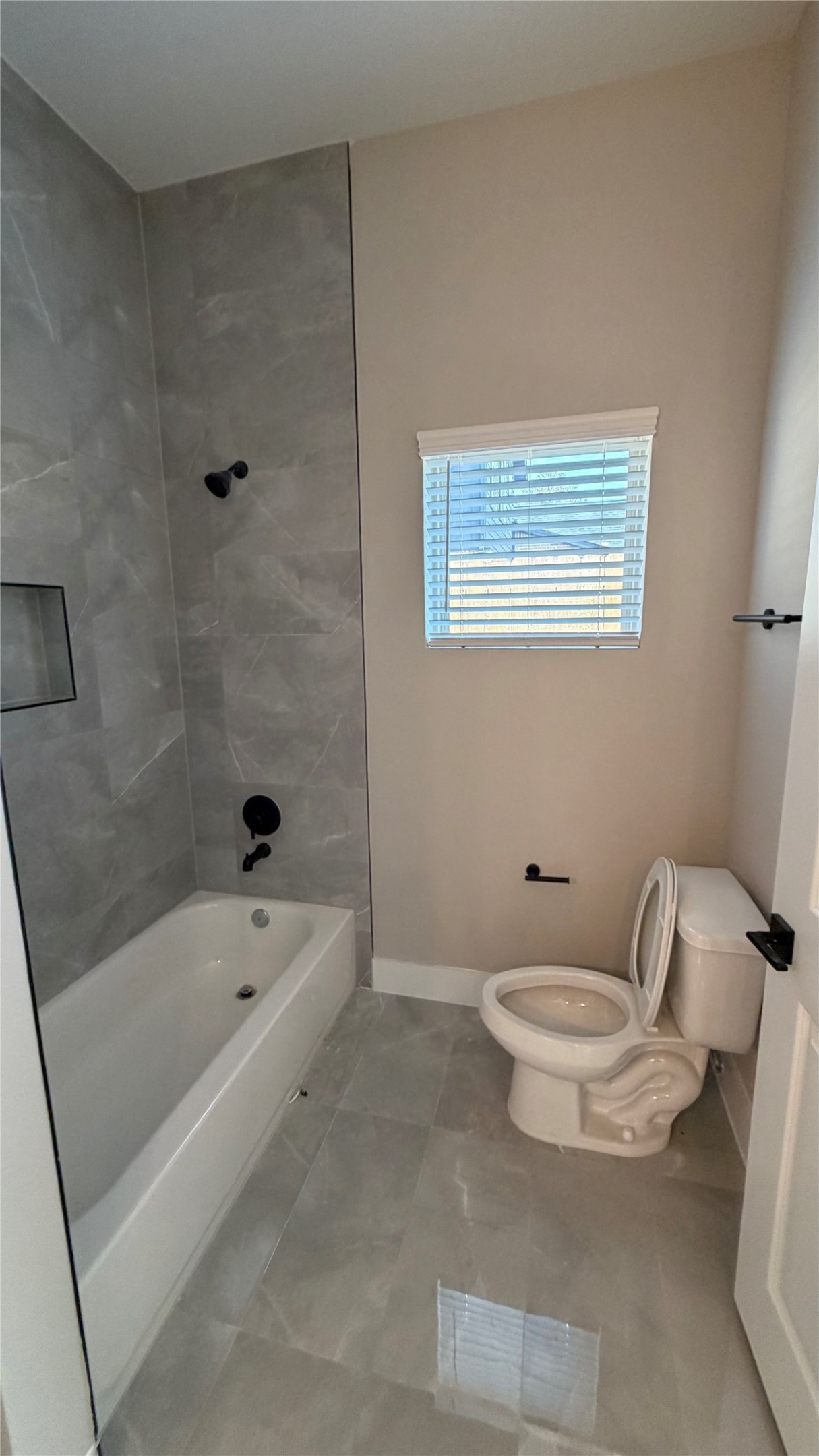 2607 Piemonte Avenue Cir Spring Spring, TX 77388 - Photo 16 of 38 a white toilet sitting next to a bath tub