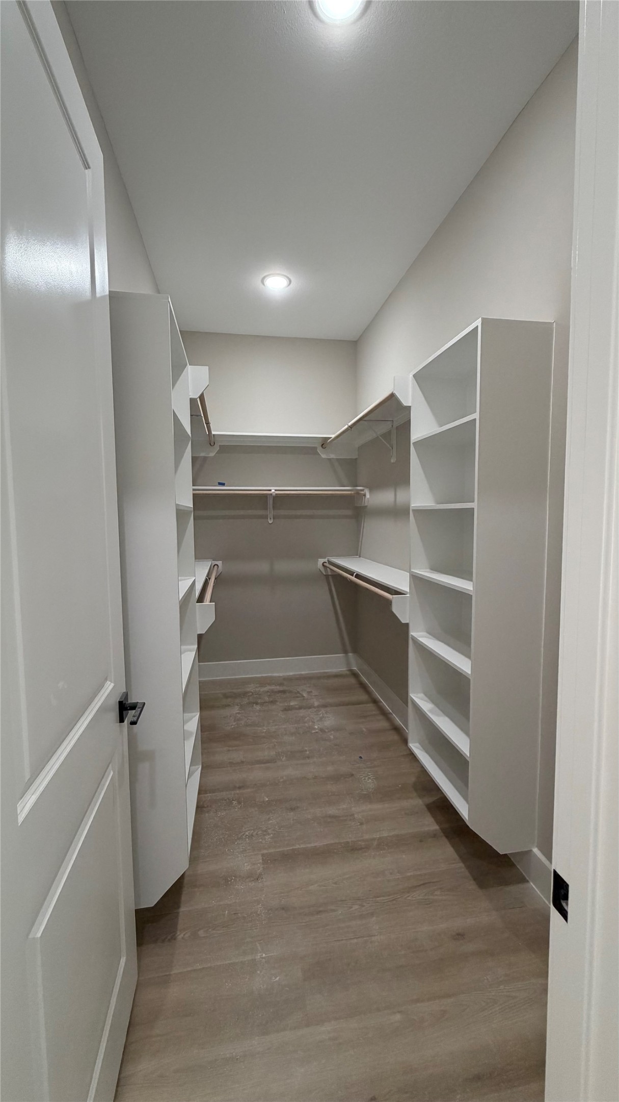 2607 Piemonte Avenue Cir Spring Spring, TX 77388 - Photo 9 of 38 a view of walk in closet with empty racks