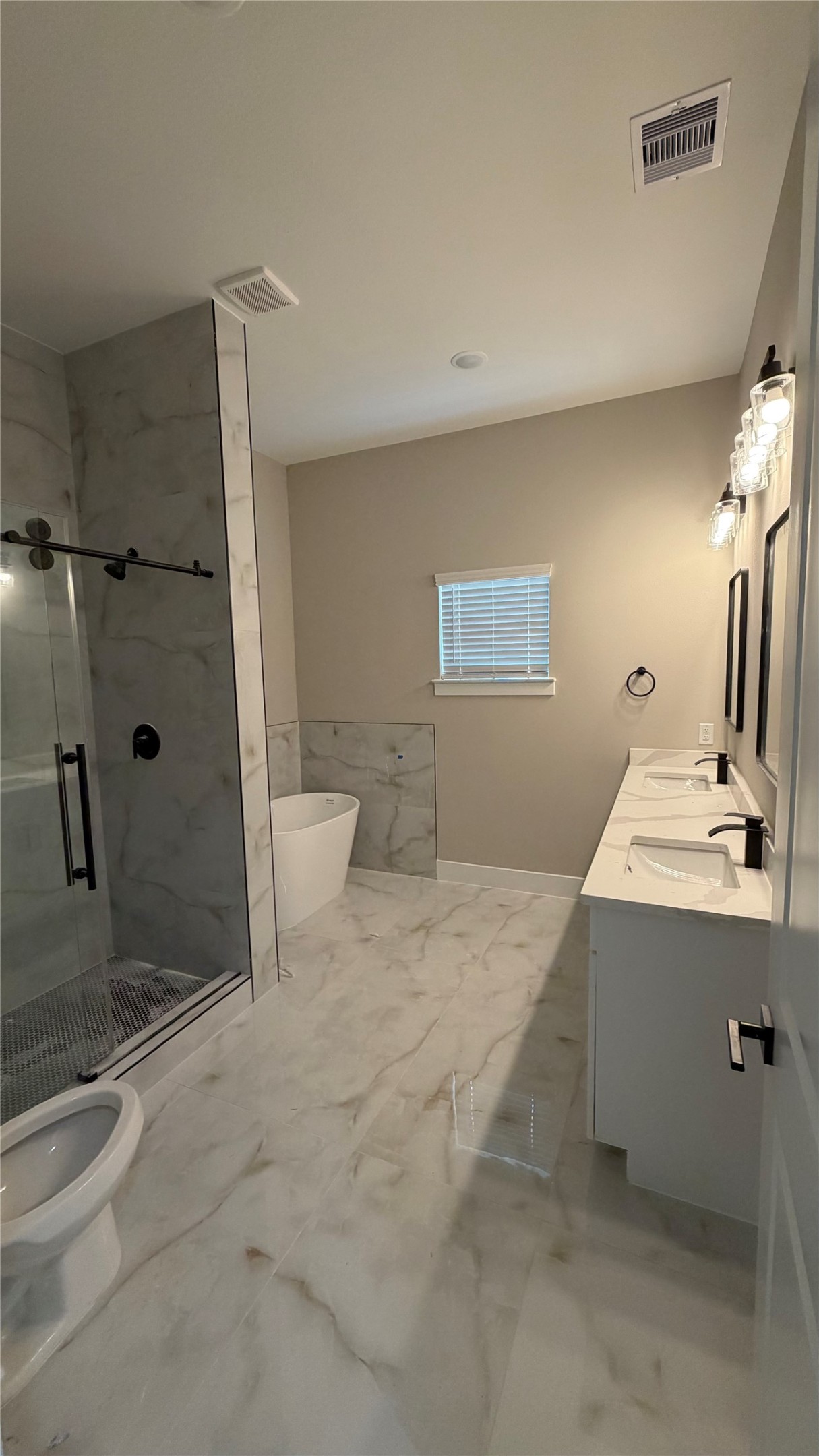 2607 Piemonte Avenue Cir Spring Spring, TX 77388 - Photo 10 of 38 a bathroom with a sink a toilet and shower
