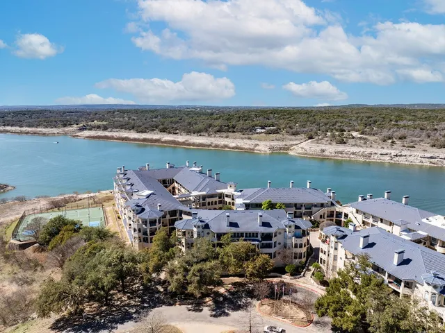 a view of a lake with a city