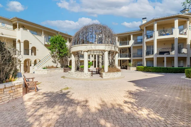 an aerial view of a house with garden space and houses view