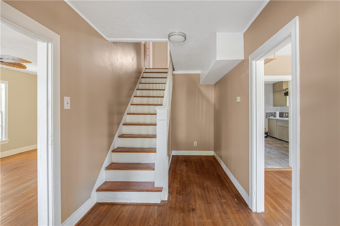 1207 East 27th Street Bryan, TX 77803 - Photo 11 of 23 a view of entryway with wooden floor