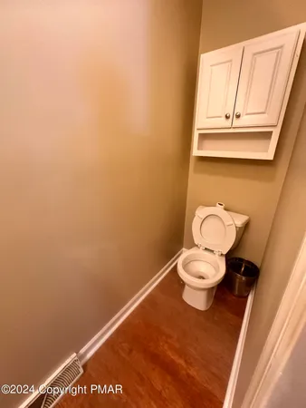 a bathroom with a toilet