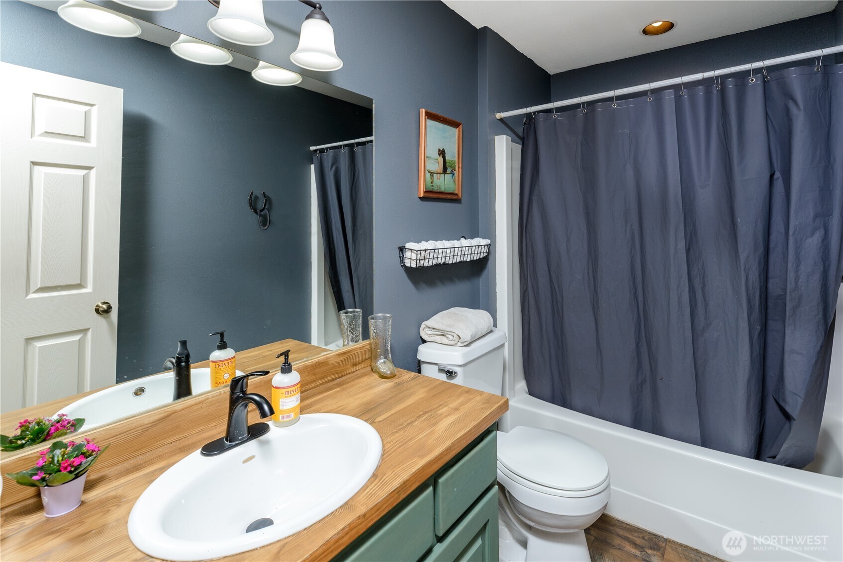 134 Bishop Road Port Angeles, WA 98363 - Photo 22 of 38 a bathroom with a sink a toilet and mirror
