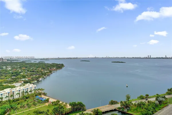 a view of a lake with a beach