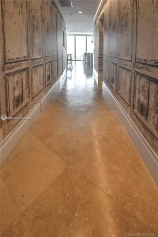 a view of gallery with wooden floor