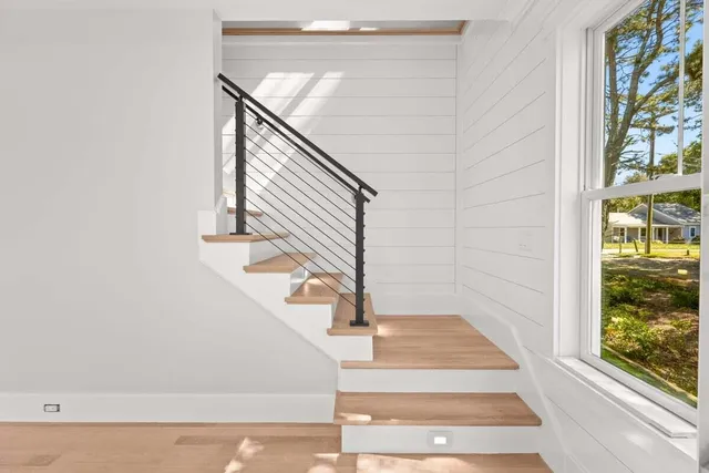 a bathroom with a bathtub and a sink